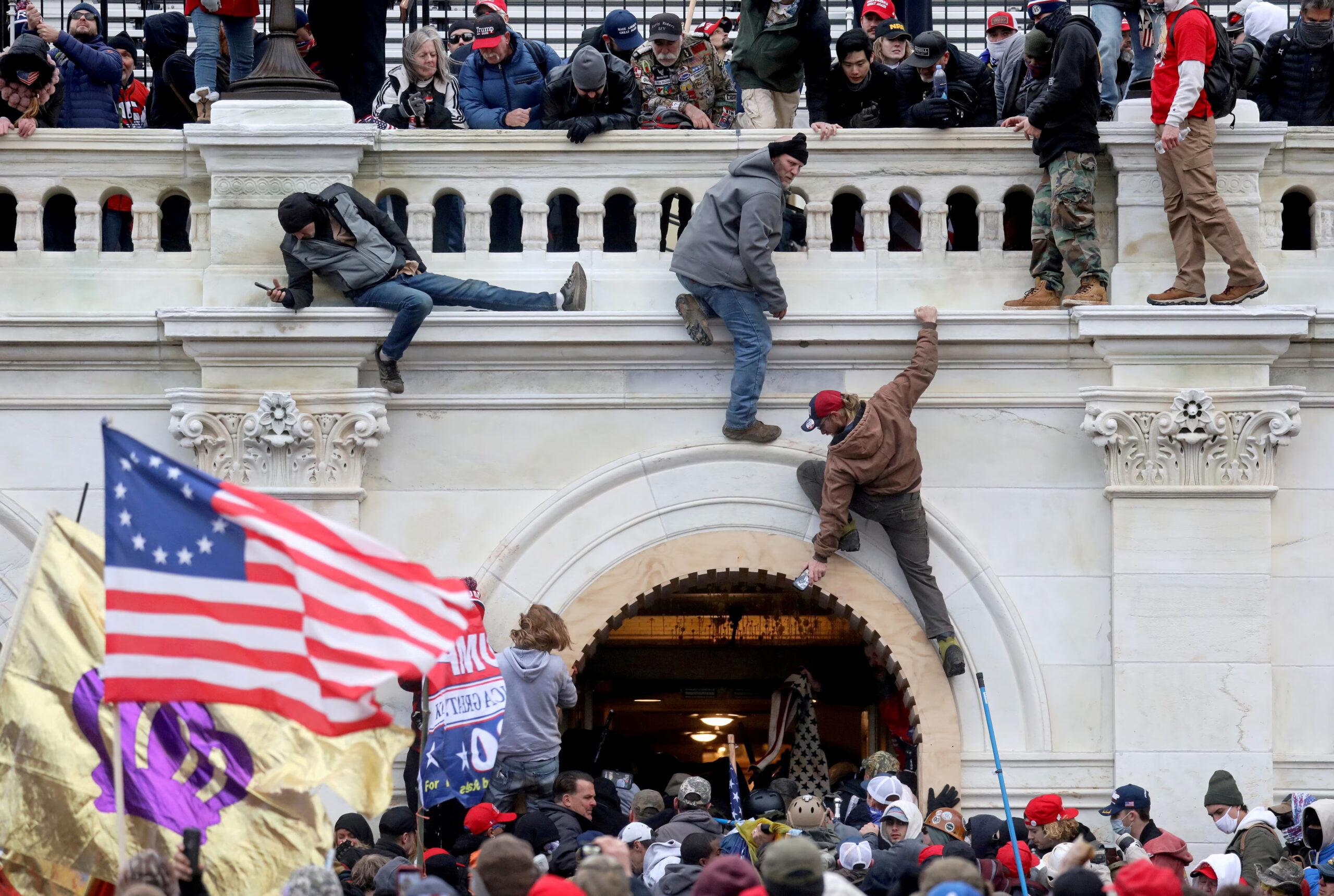 Domestic Terrorists Climbing Capitol Wall